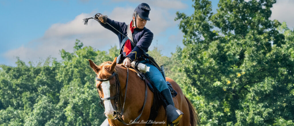 A female soldier sheathing her saber, her expression one of determination and focus. Dressed in a military uniform, she stands confidently as she returns her weapon to its scabbard, embodying both strength and grace in a moment of calm after action.